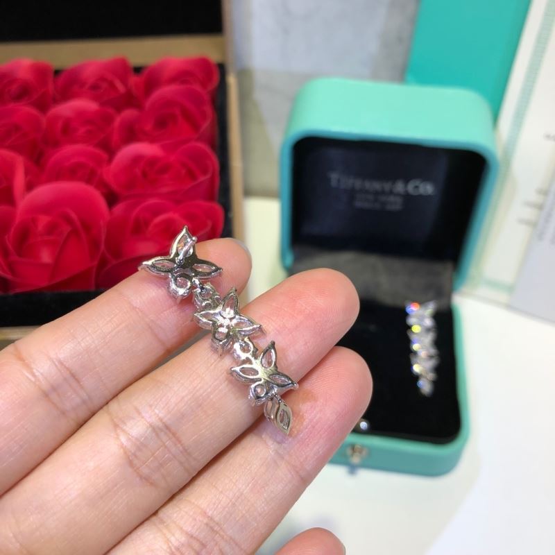 T*f*ny earrings